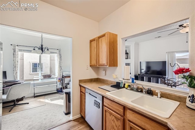 kitchen with decorative light fixtures, dishwashing machine, light colored carpet, ceiling fan with notable chandelier, and sink