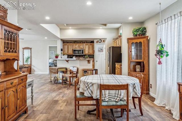 dining room featuring light wood-type flooring