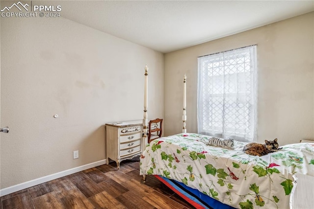 bedroom featuring dark hardwood / wood-style floors