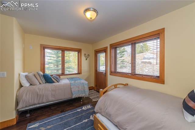 bedroom featuring dark hardwood / wood-style floors