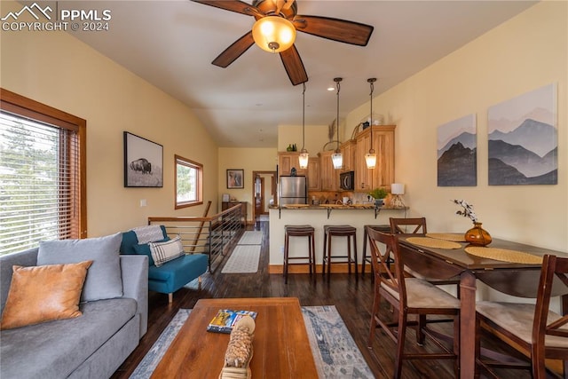 living room featuring lofted ceiling, ceiling fan, and dark hardwood / wood-style flooring