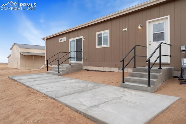 back of house featuring a patio area