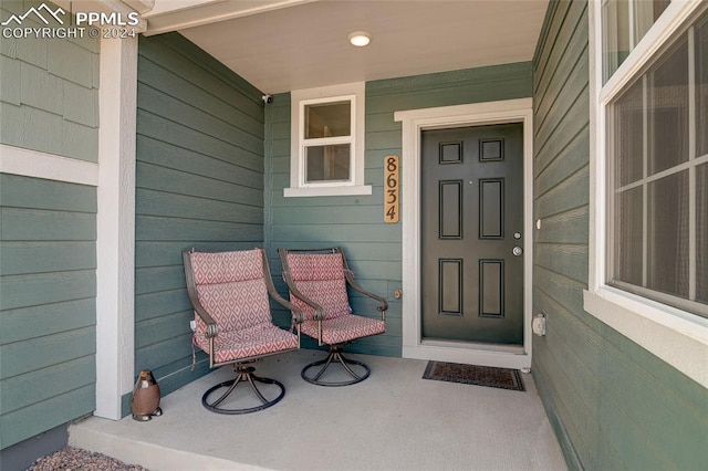 entrance to property with a porch