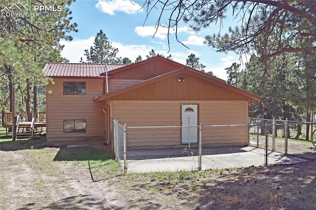 view of home's exterior featuring a deck