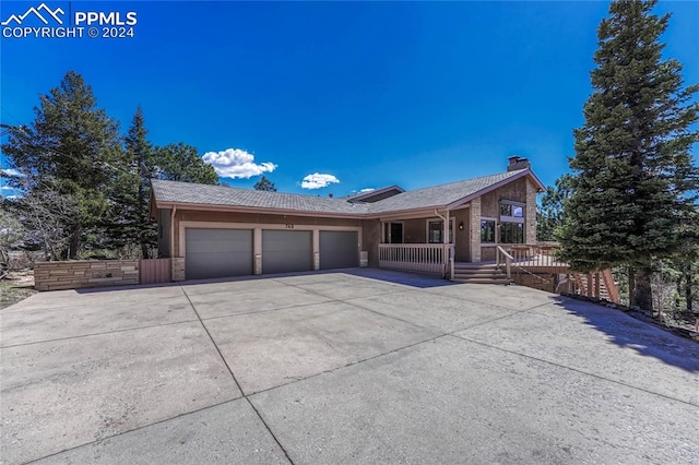 ranch-style home with a garage