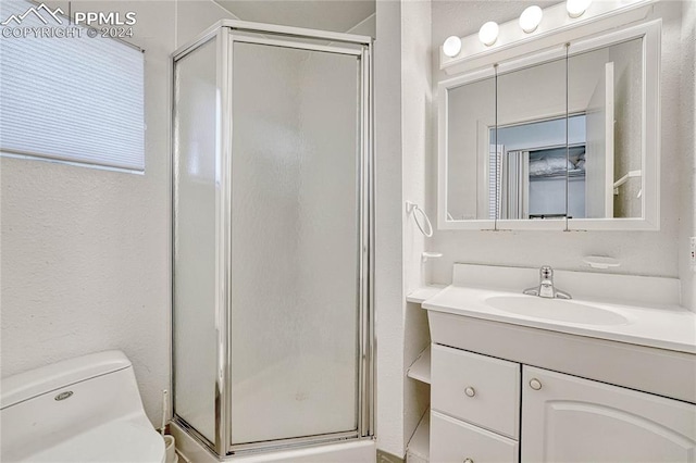 bathroom with an enclosed shower, toilet, and vanity