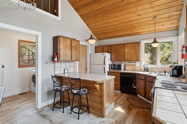 kitchen with wooden ceiling, white appliances, backsplash, and pendant lighting