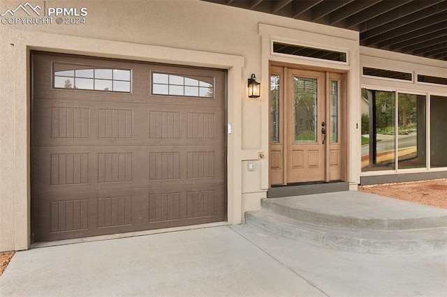 property entrance featuring a garage