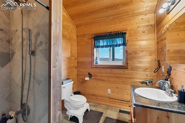 bathroom with oversized vanity, wooden walls, toilet, tile floors, and wooden ceiling