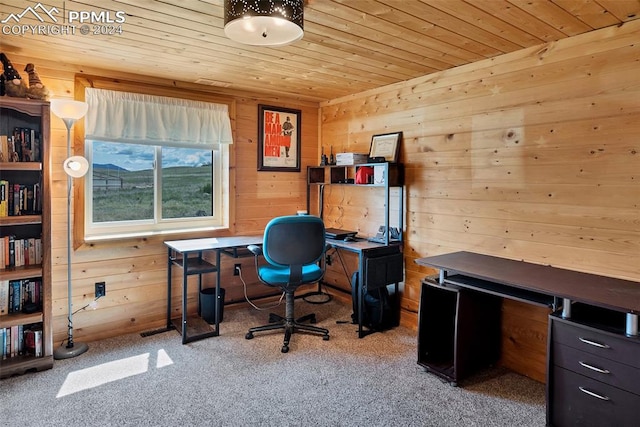 home office featuring light carpet, wooden walls, and wood ceiling