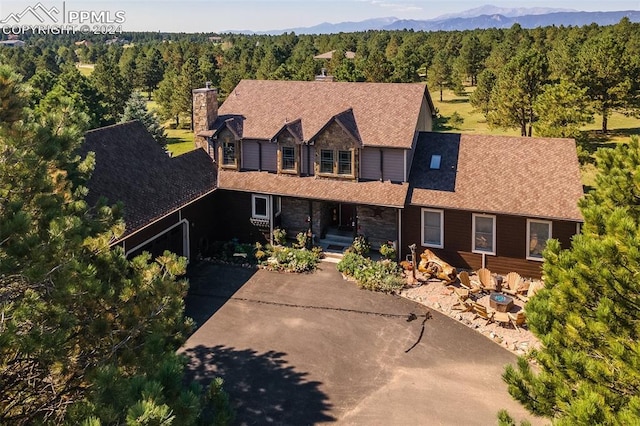 drone / aerial view featuring a mountain view