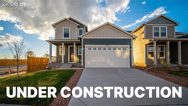 craftsman house featuring covered porch and a garage