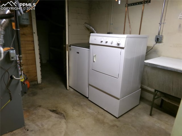 laundry room with washer and dryer