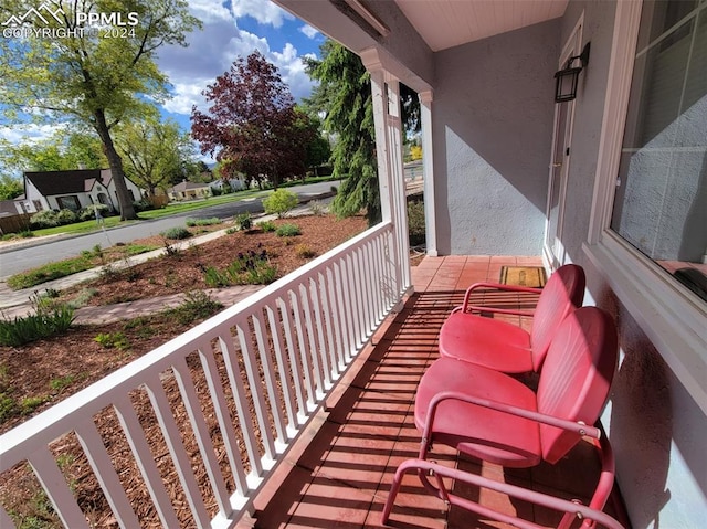 balcony featuring a porch