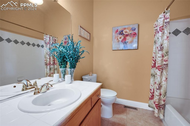4529 Songglen Cir, Colorado Springs, CO 80906 - full bathroom with shower / tub combo with curtain, vanity, tile floors, and toilet