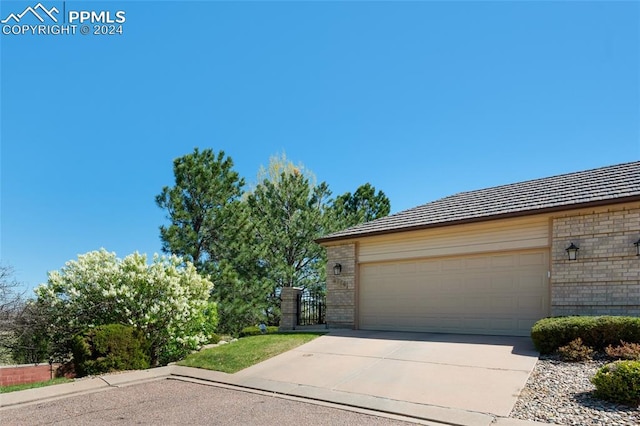 view of front of home with a garage