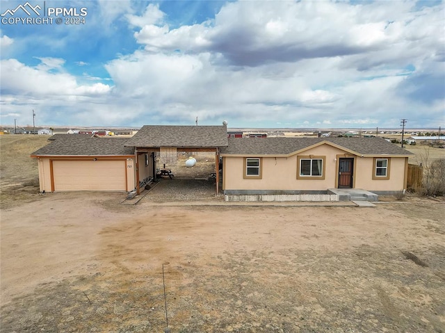 ranch-style house with a garage