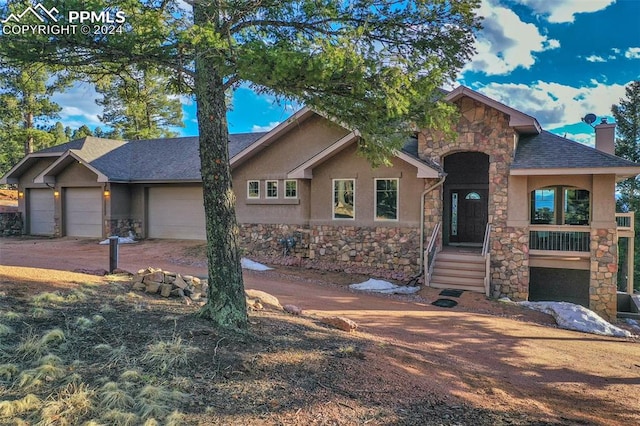 view of front of home with a garage