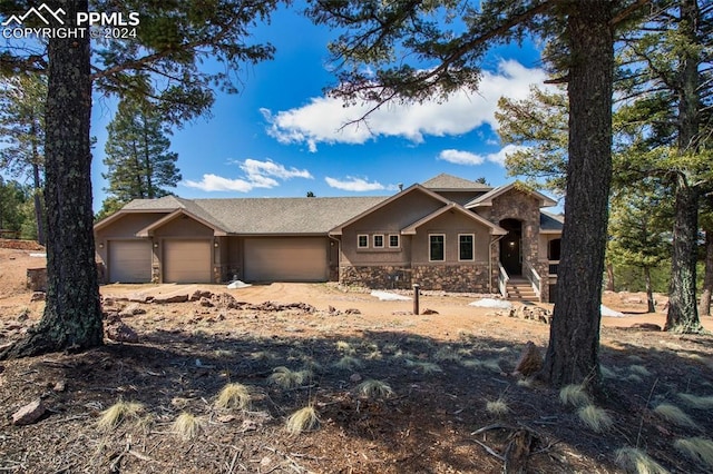 view of front of property with a garage