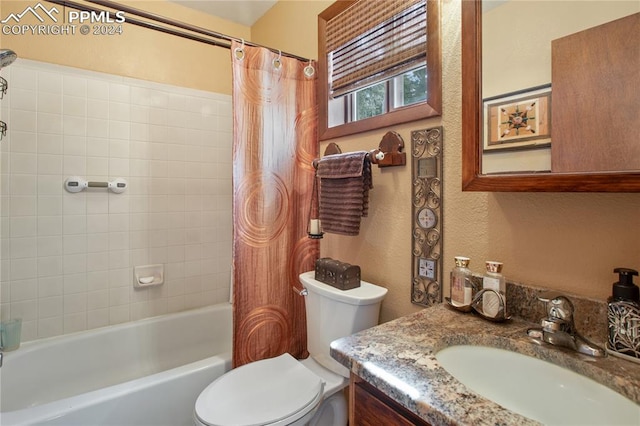 carpeted bedroom with a textured ceiling and lofted ceiling