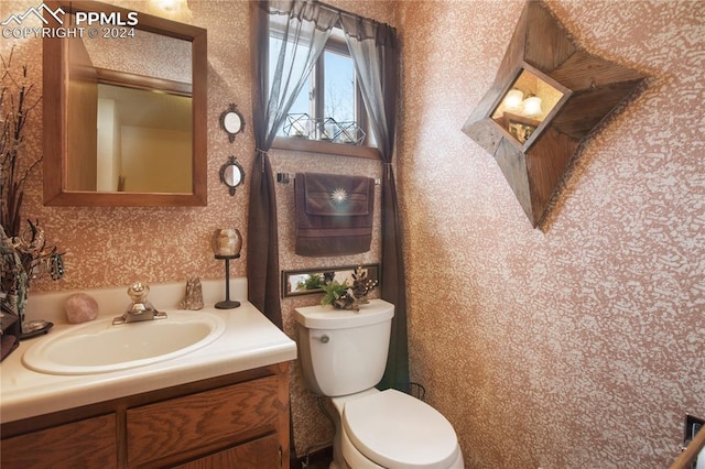 laundry room with washing machine and dryer, gas water heater, tile floors, hookup for a washing machine, and cabinets