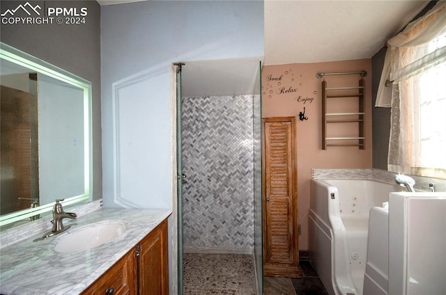 bathroom with a bathtub and vanity