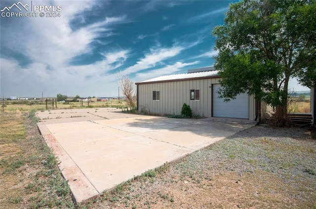 view of outbuilding featuring a garage