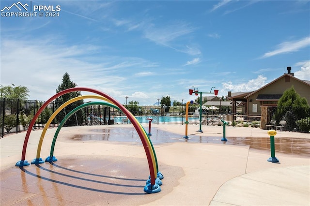 view of home's community featuring a playground