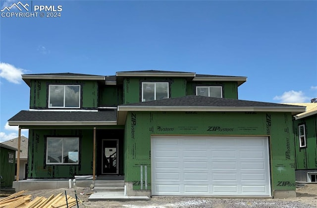 view of front of house with a garage