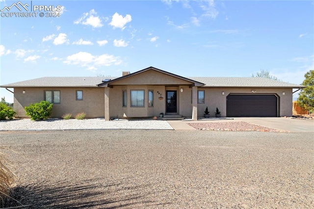 ranch-style house with a garage