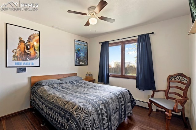 bedroom featuring ceiling fan, a baseboard radiator, and dark wood-type flooring