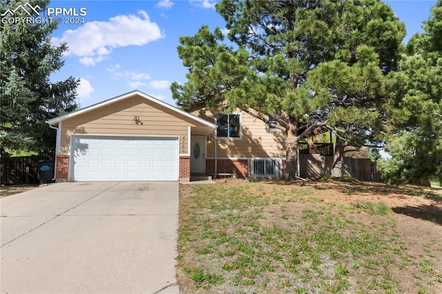 split level home with a garage