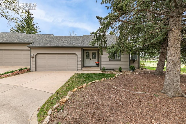 single story home featuring a garage