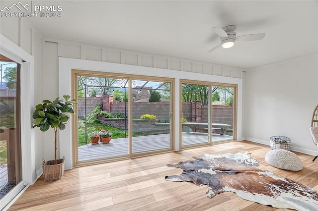 interior space with ceiling fan and a healthy amount of sunlight