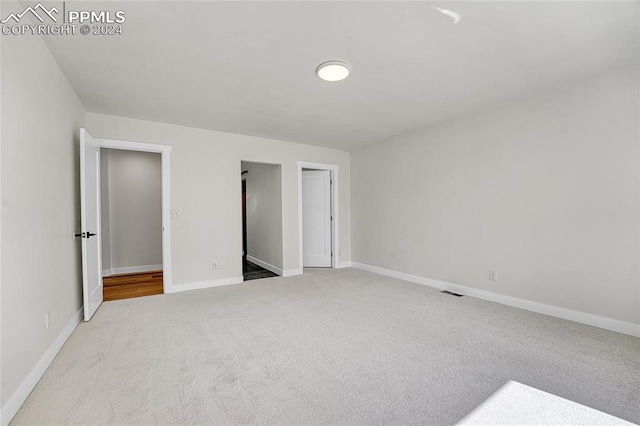 unfurnished bedroom with carpet flooring