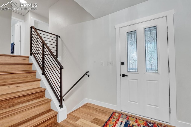 foyer with light hardwood / wood-style floors