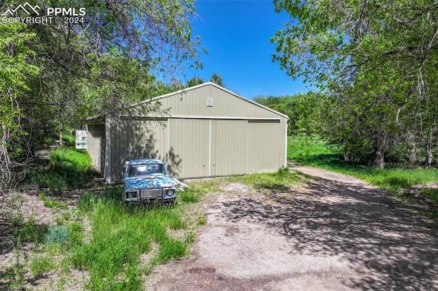 view of outdoor structure featuring a garage