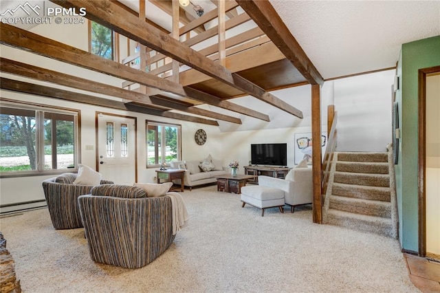 living room featuring beam ceiling, carpet, and a baseboard heating unit