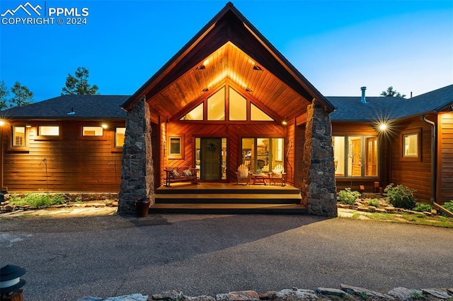 contemporary home featuring covered porch