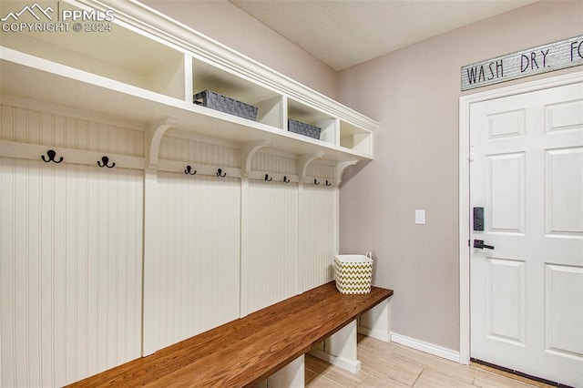 mudroom featuring light tile patterned floors