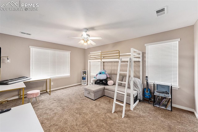 carpeted bedroom featuring ceiling fan