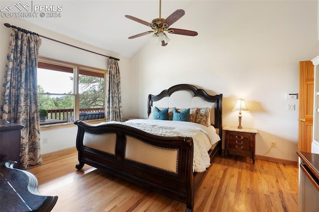 bedroom with vaulted ceiling, ceiling fan, and light wood-type flooring