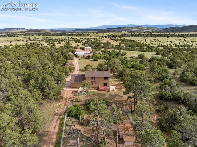 bird's eye view with a mountain view