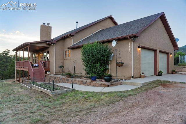 view of front of property with a garage