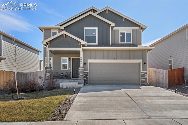 craftsman-style house featuring a garage