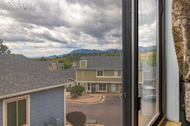 exterior space featuring a mountain view