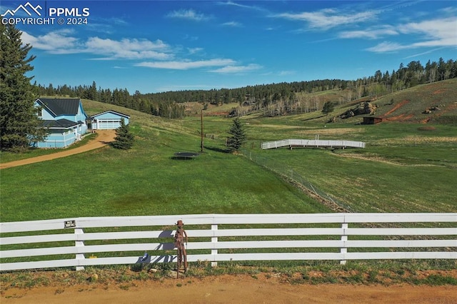 exterior space with a rural view