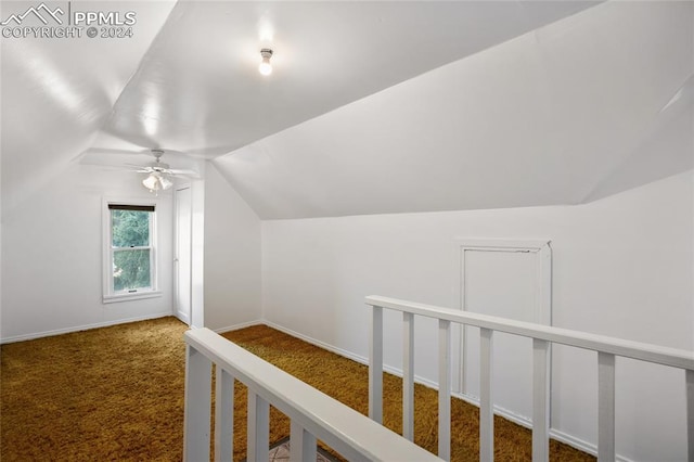 bonus room with lofted ceiling, carpet floors, and ceiling fan