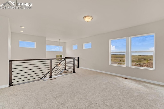 9759 Feathergrass Dr, Colorado Springs, CO 80927 - carpeted spare room featuring plenty of natural light and recessed lighting
