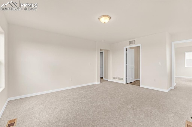 9759 Feathergrass Dr, Colorado Springs, CO 80927 - empty room featuring carpet floors and baseboards